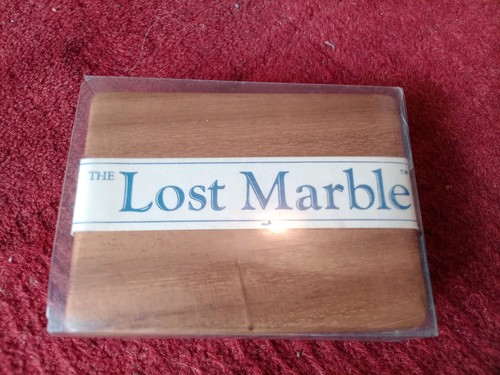 The lost marble - marble, wooden